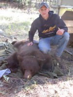 Tucker Seitz with Radiocollared Bear